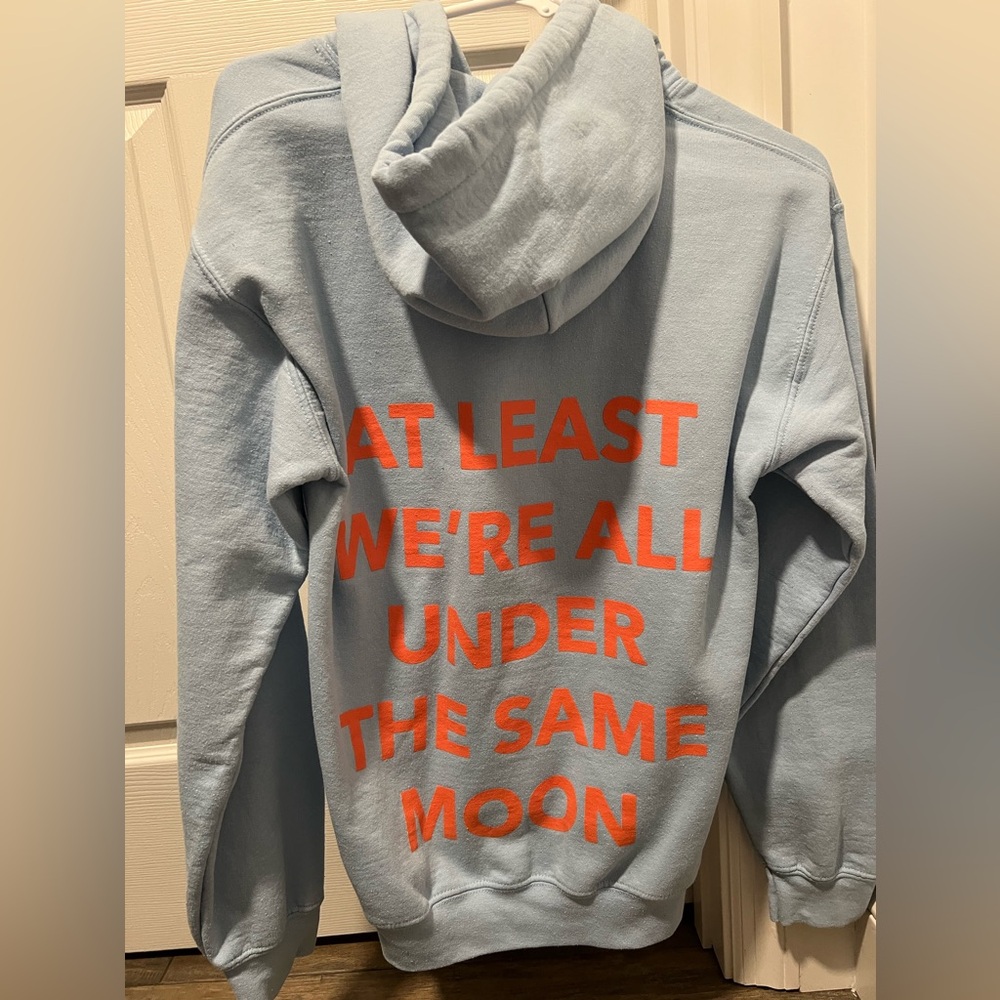 at least we’re all under the same moon hoodie